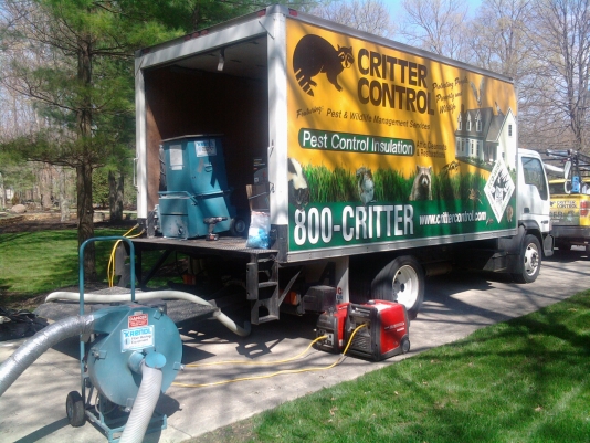 Critter Control Truck with Attic Restoration Equipment